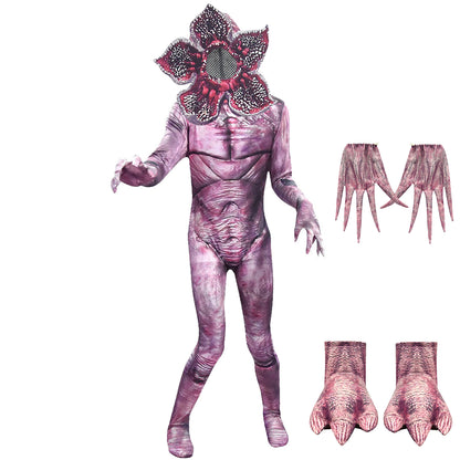 A monster-themed Halloween costume set for kids, including a purple zentai jumpsuit with a spiky tail, a piranha mask, and matching gloves and foot covers.